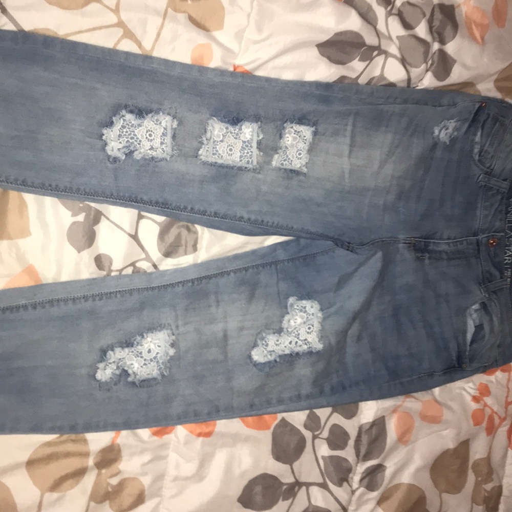 Mid rise skinny jeans with lace details